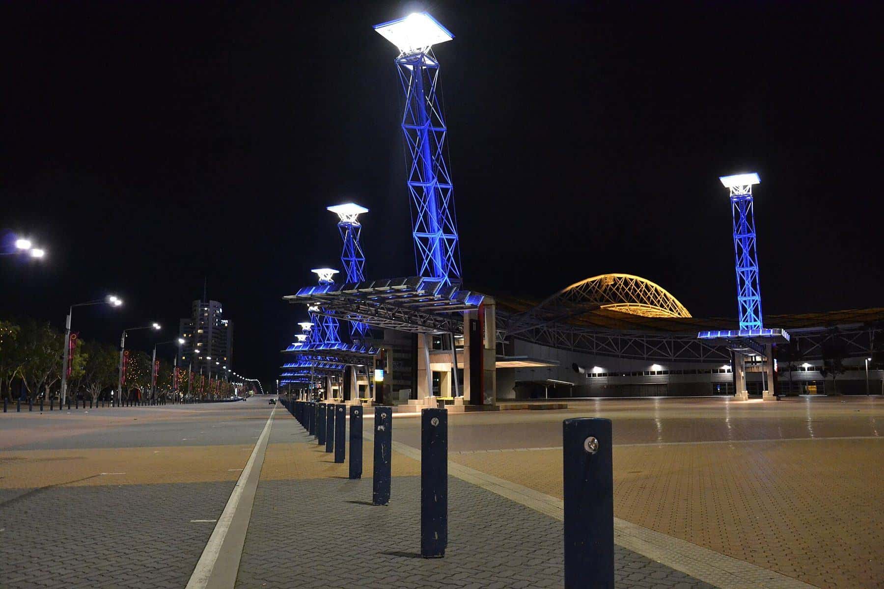 Olympic Boulevard lit up at night at Sydney Olympic Park