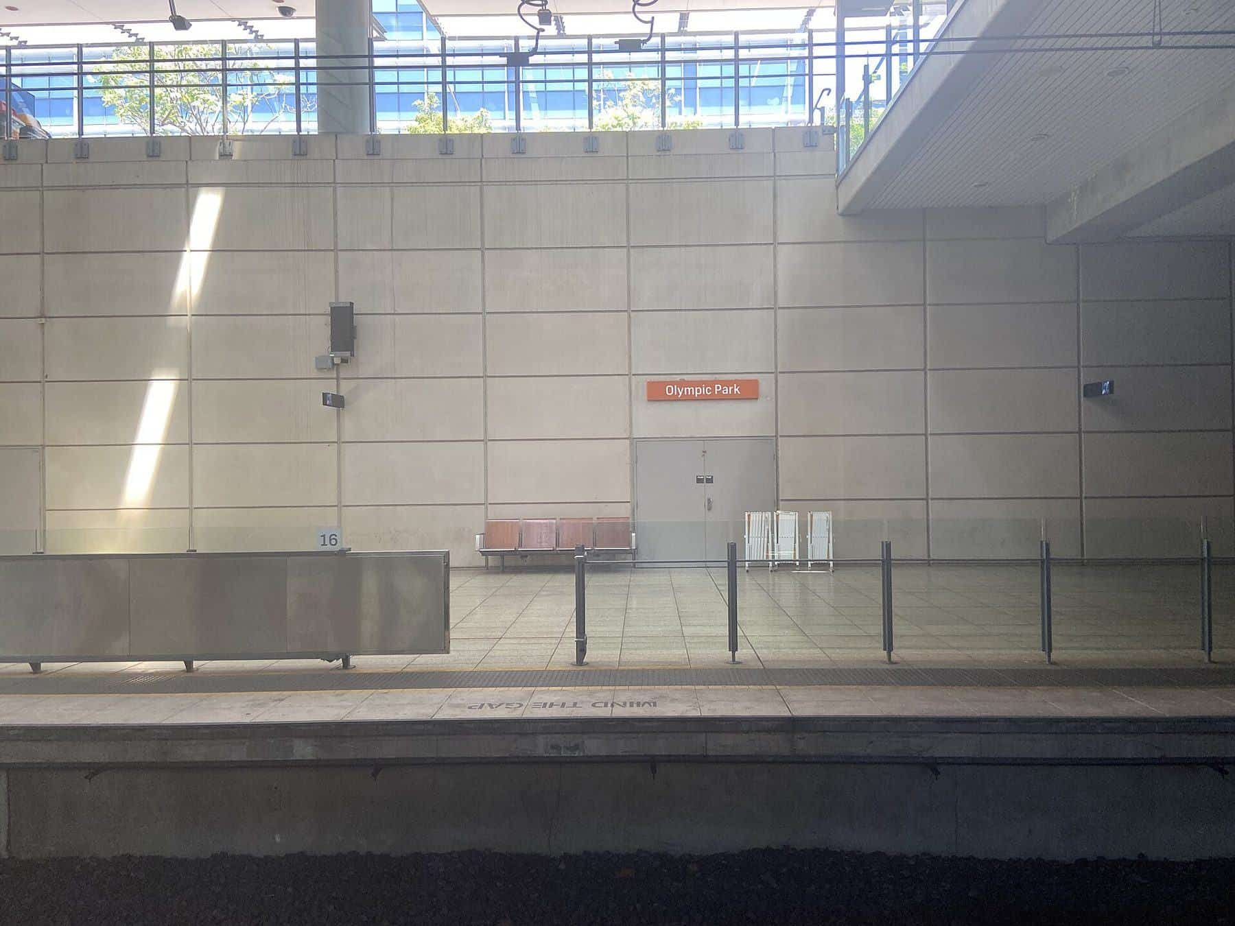 Platforms under the arched roof of Olympic Park railway station